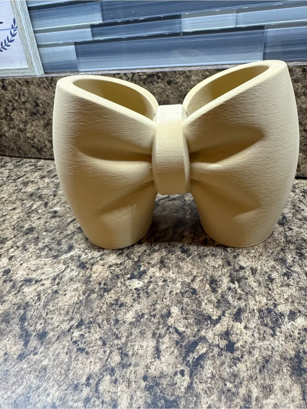 3d printed Bow-Shaped Toothbrush & Toothpaste Holder in Beige